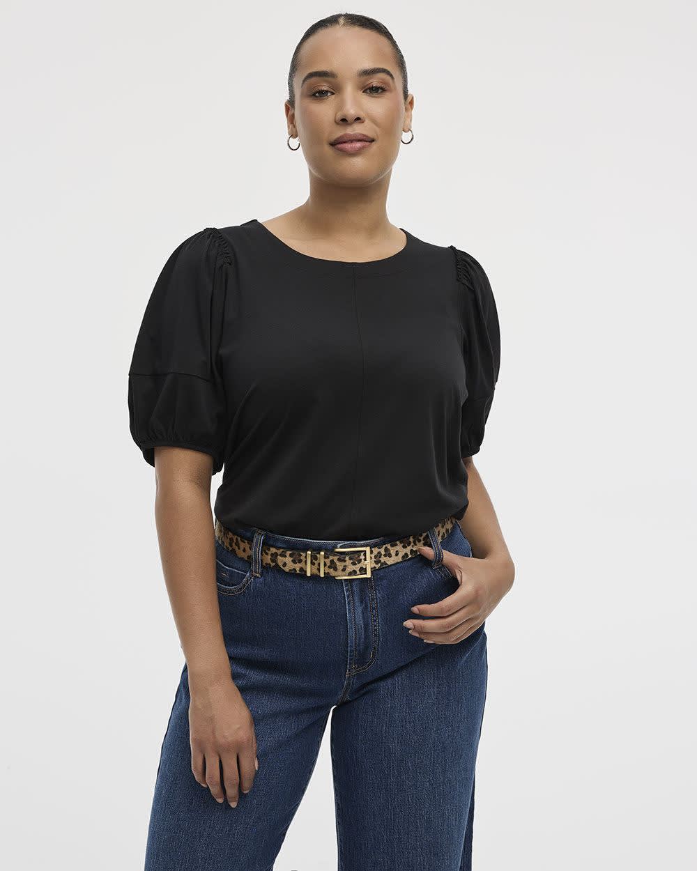 Haut à manches aux coudes bouffantes et col rond