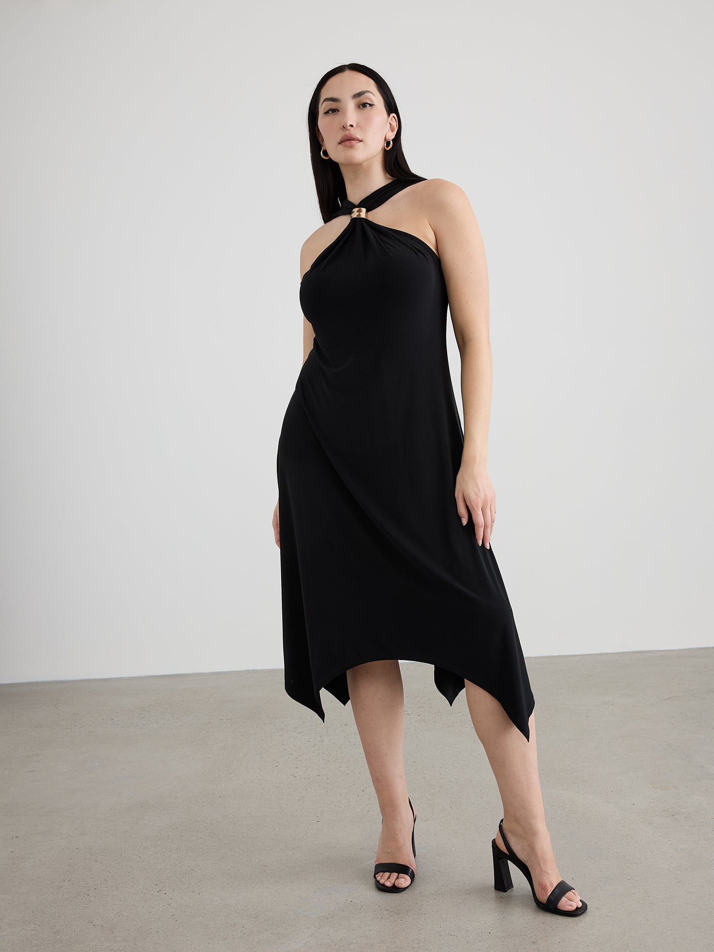 Women's Sleeveless Halter Dress with Handkerchief Hem | Reitmans Women's Sleeveless Halter Dress with Handkerchief Hem | Reitmans