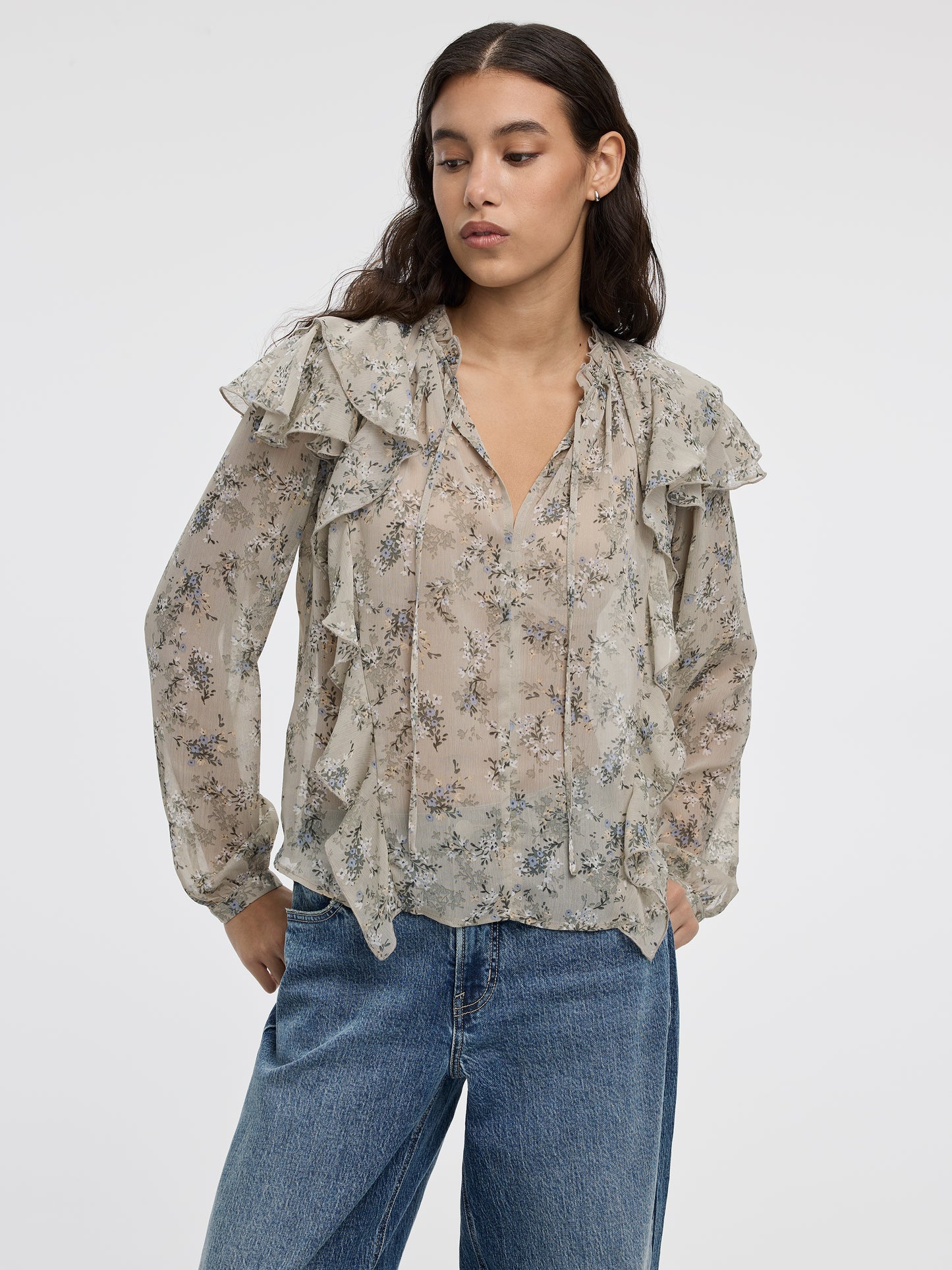 Blouse à manches longues et col fendu avec détails à volants