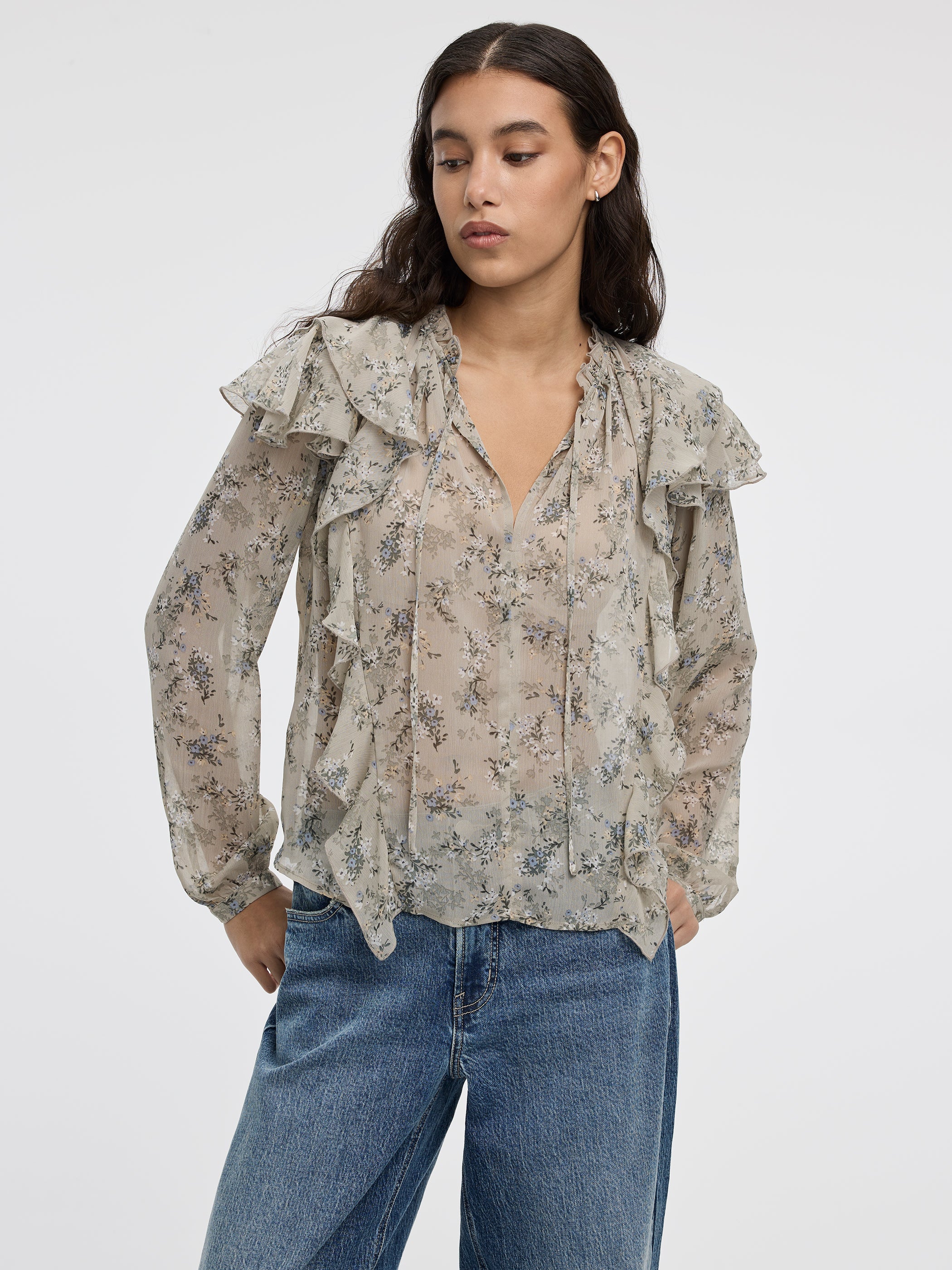 Blouse à manches longues et col fendu avec détails à volants