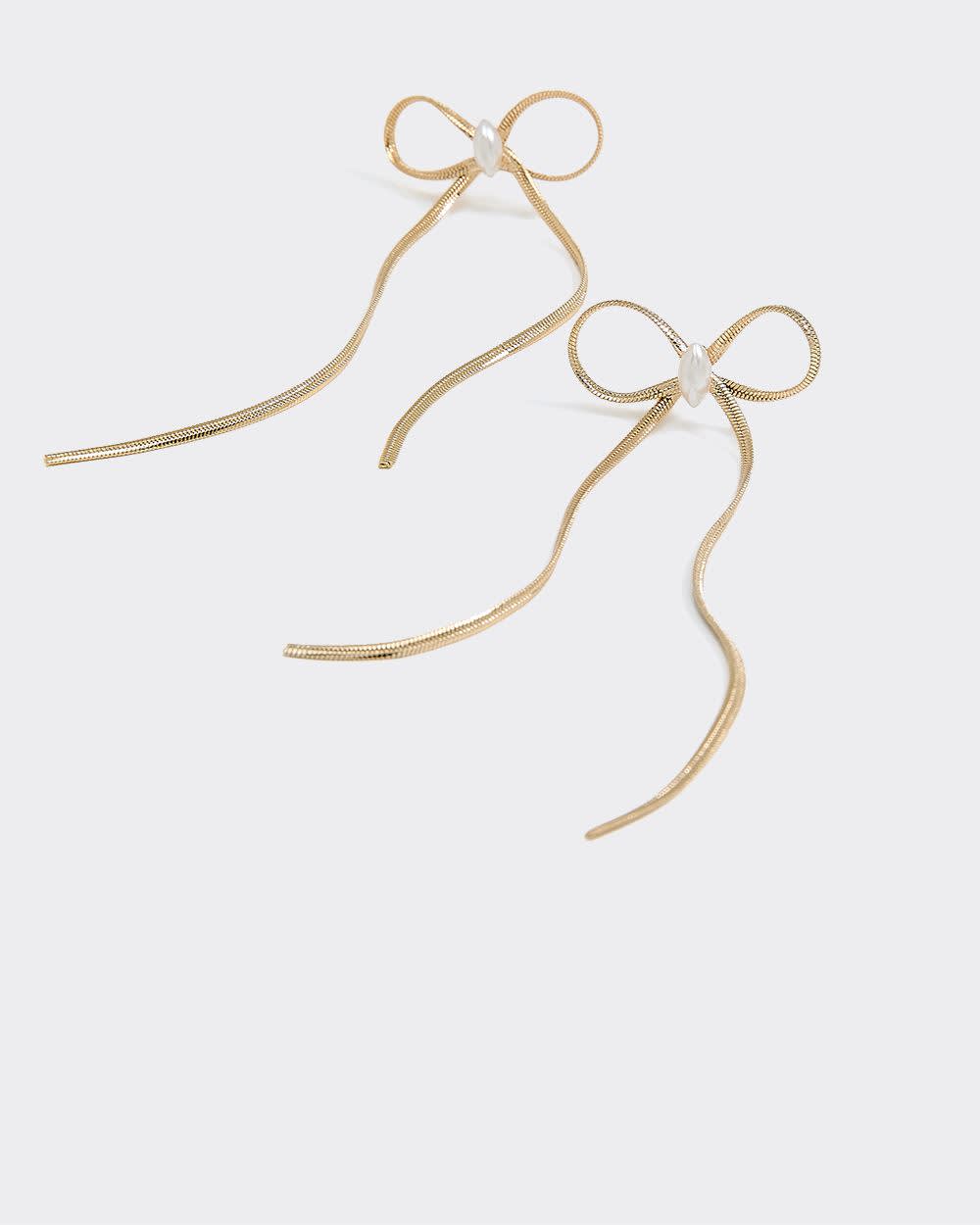 Boucles d'oreilles délicates en forme de boucle avec perles