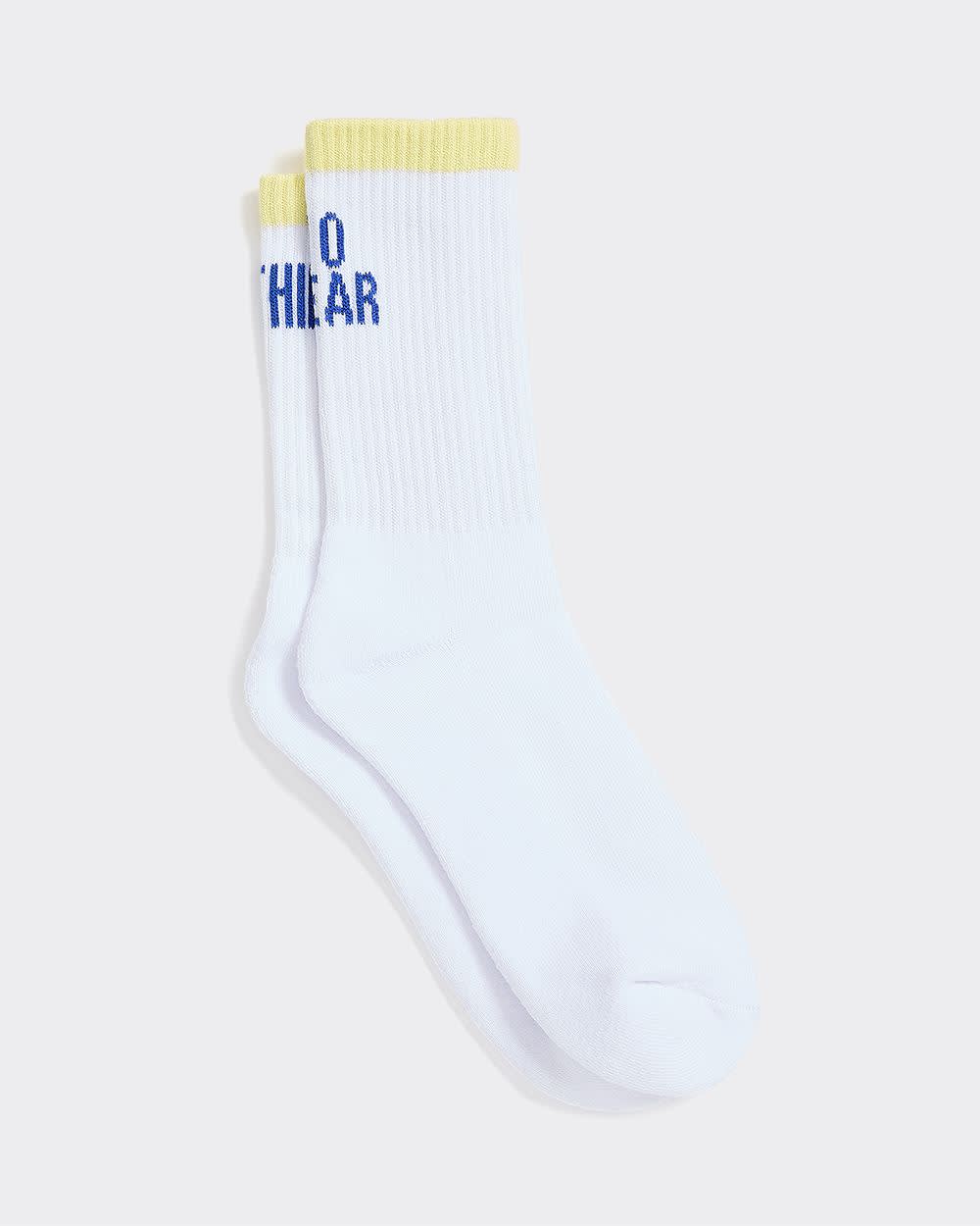 Bas côtelés avec citation à l'ourlet