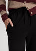 Pantalon à taille haute élastique et jambe fuselée