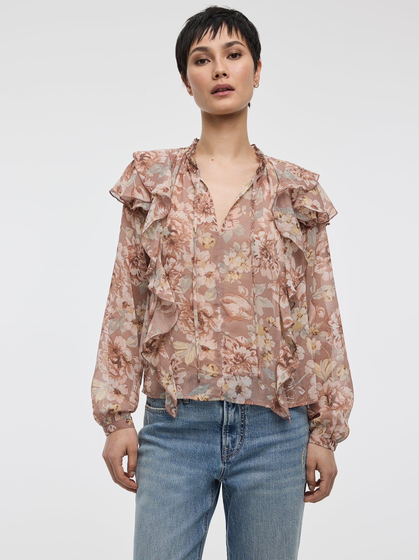 Blouse à manches longues et col fendu avec détails à volants