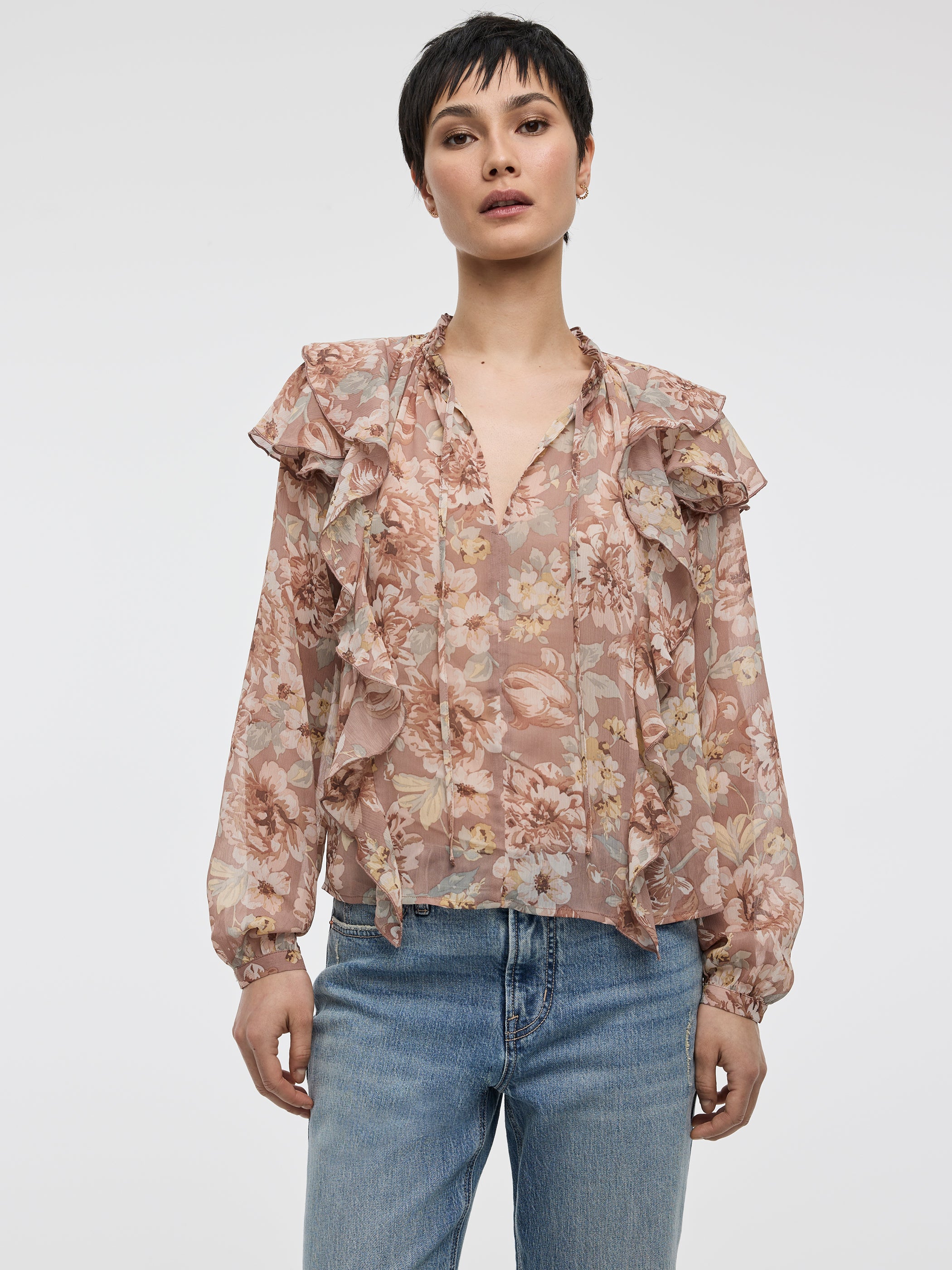 Blouse à manches longues et col fendu avec détails à volants