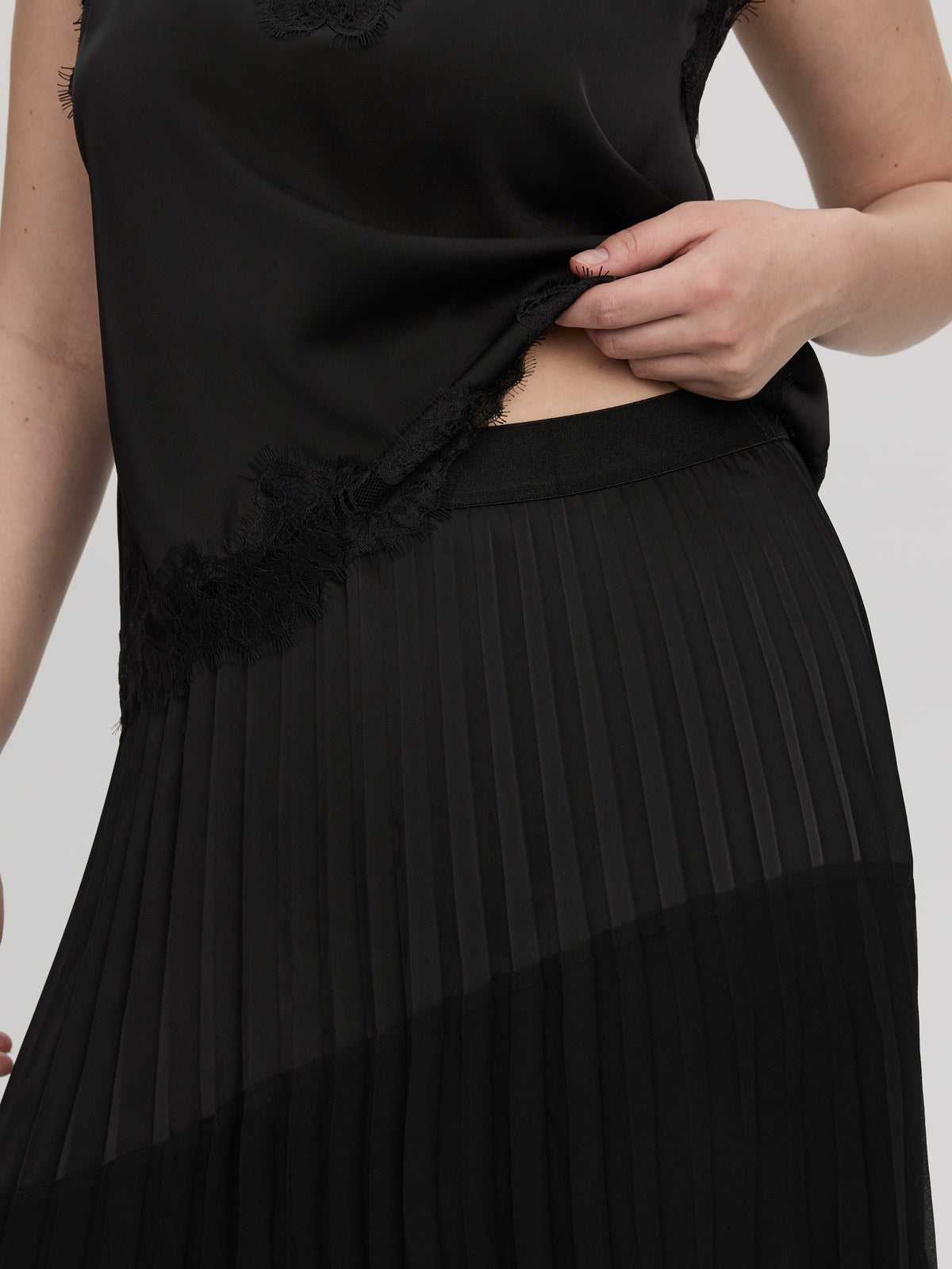 Pleated Midi Skirt with Asymmetrical Hem