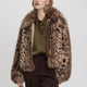 Manteau court en fourrure synthétique