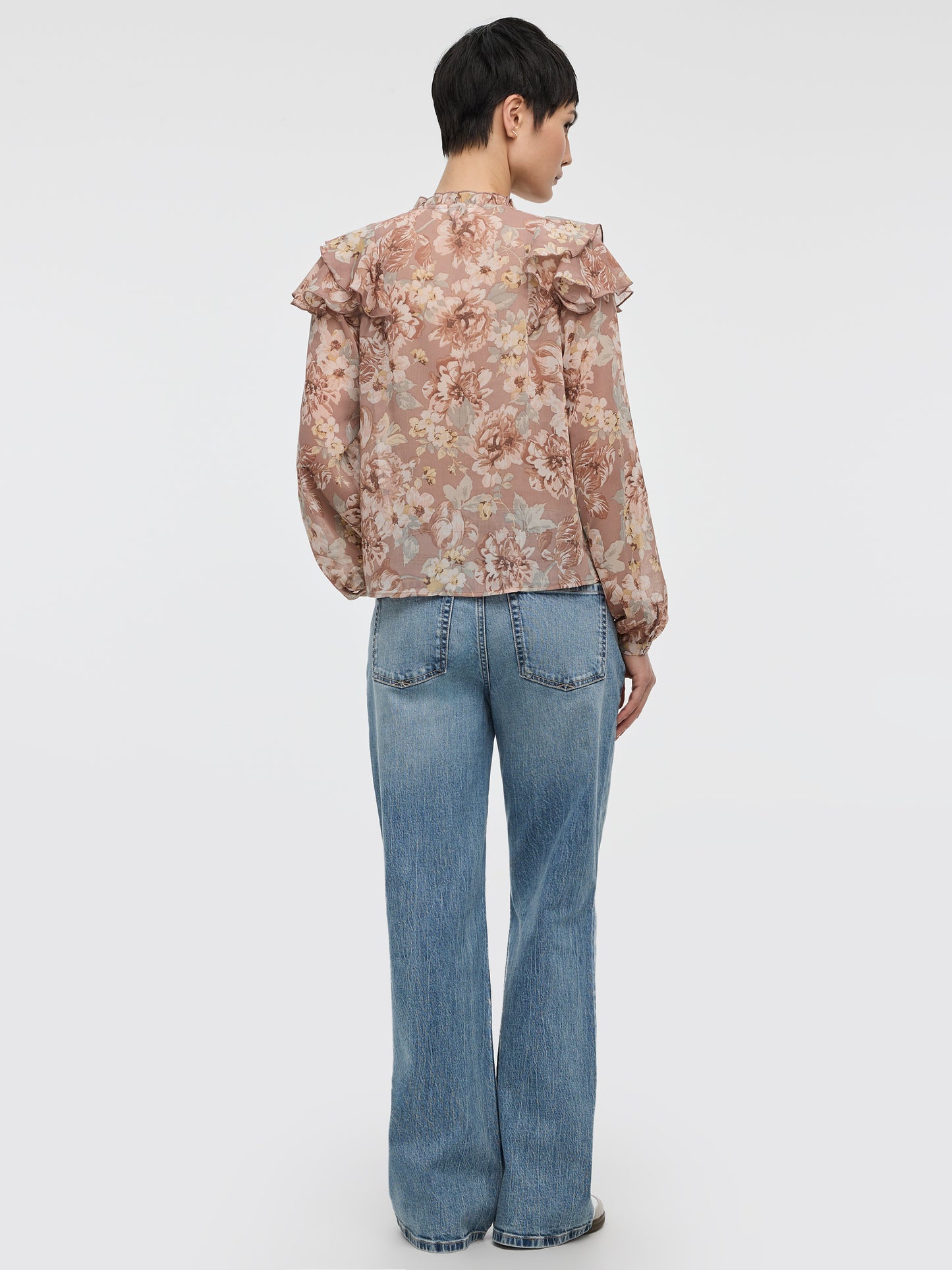 Blouse à manches longues et col fendu avec détails à volants