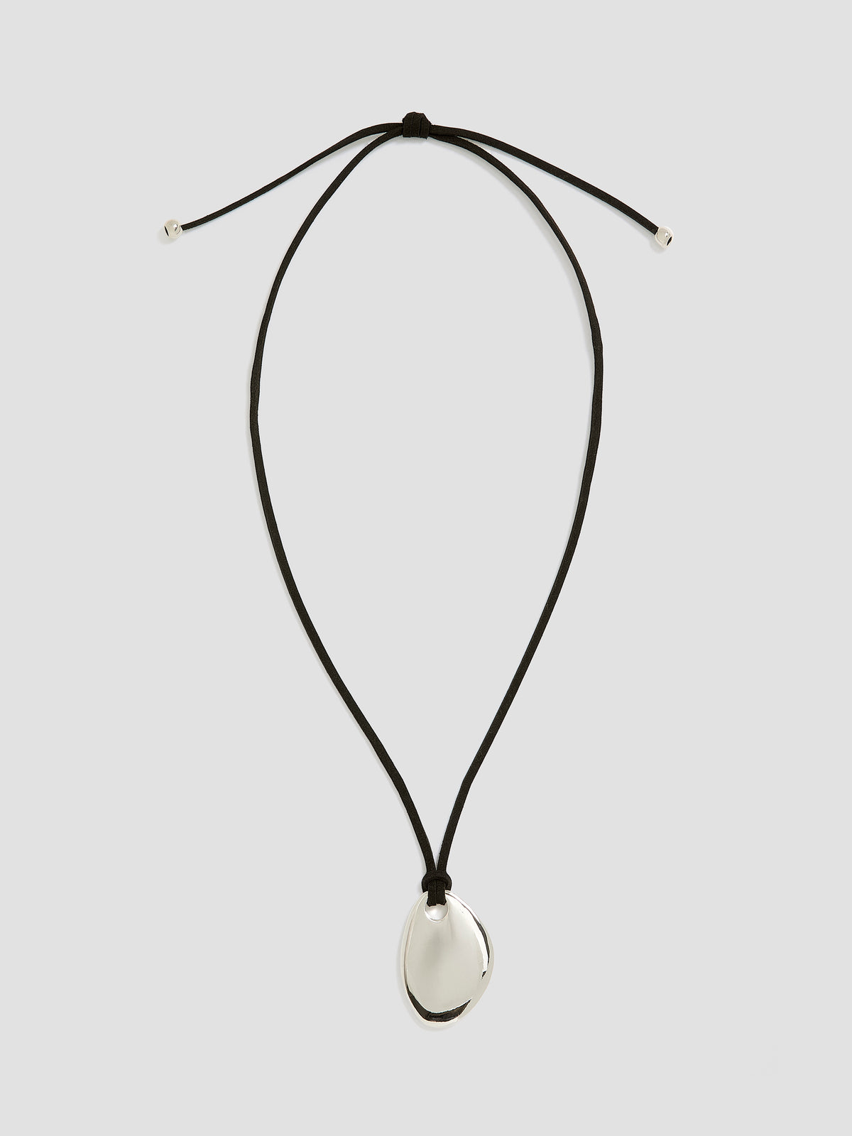 Suede Cord Necklace with Metal Pendant
