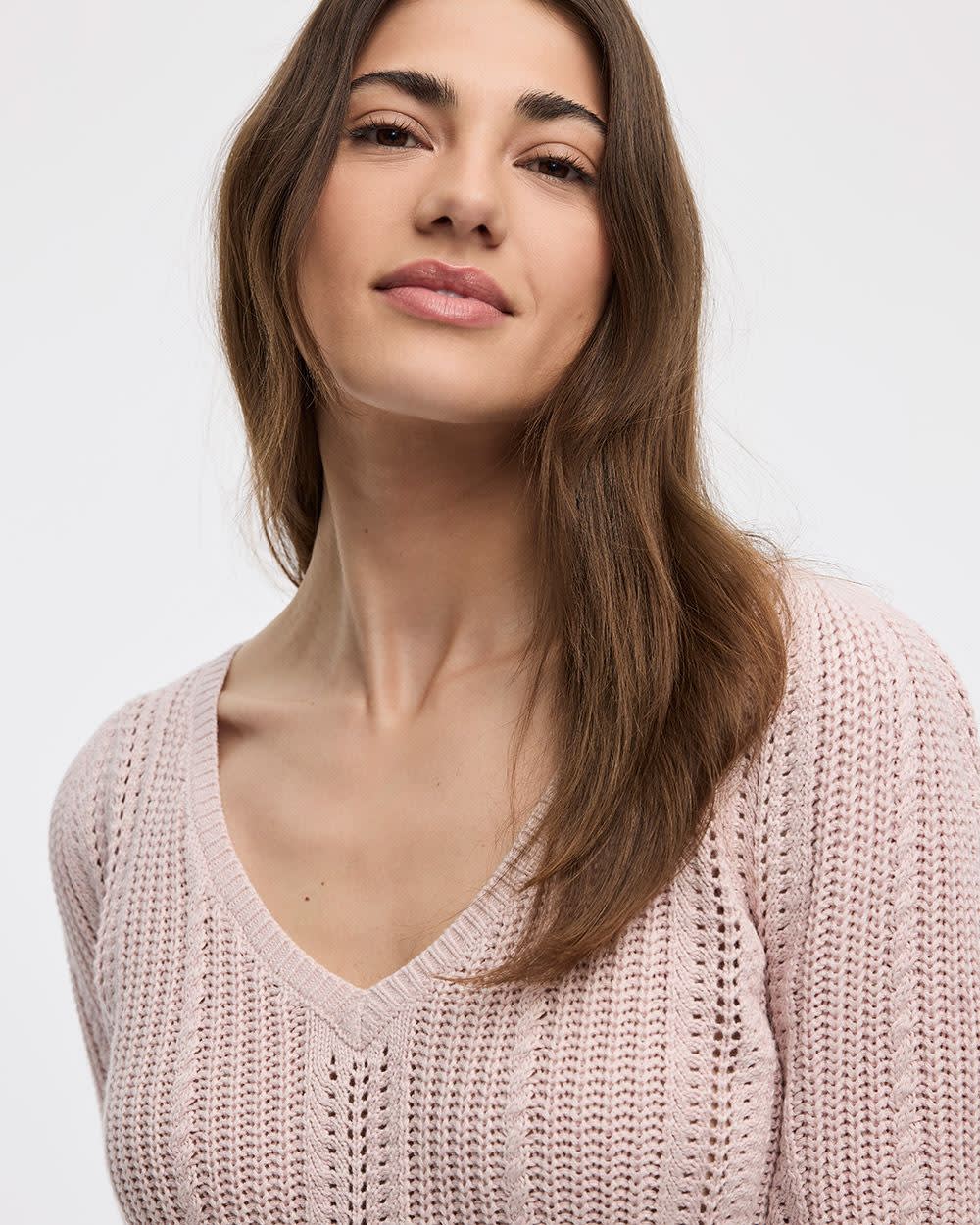 Pull à manches aux coudes bouffantes et col V