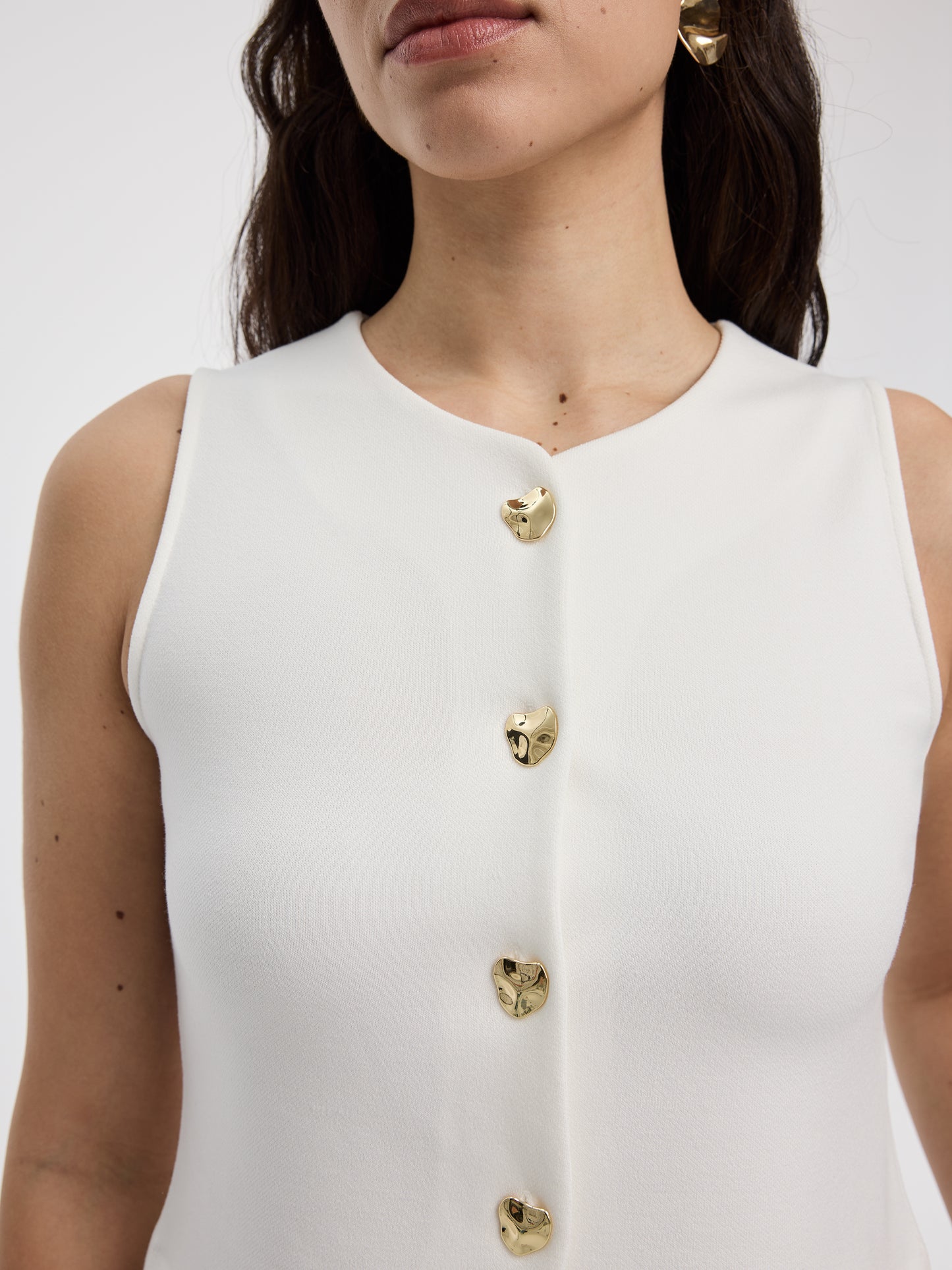 Veste sans manches à col rond