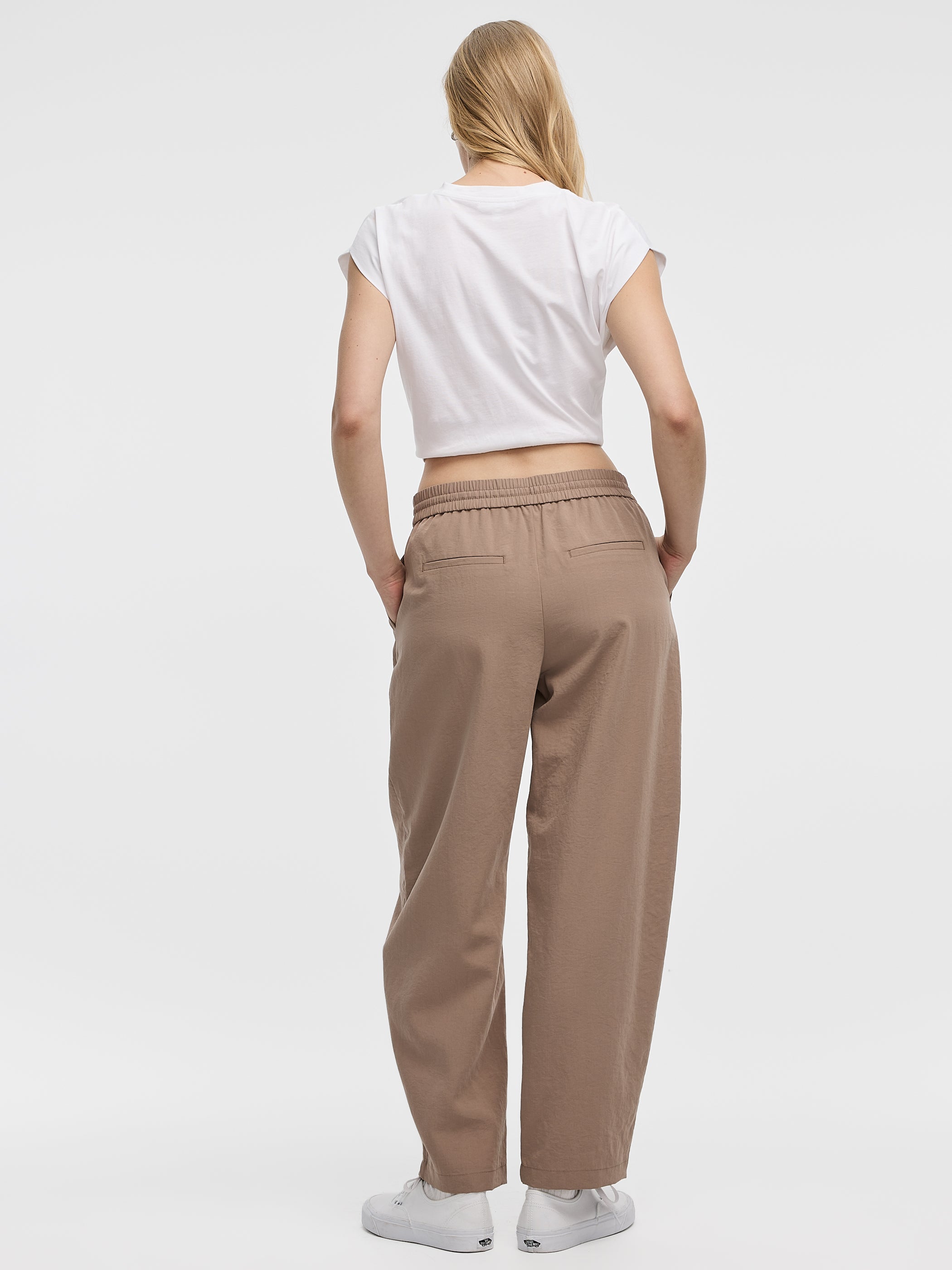 Pantalon à jambe ballon à plis nervurés