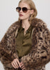 Manteau court en fourrure synthétique