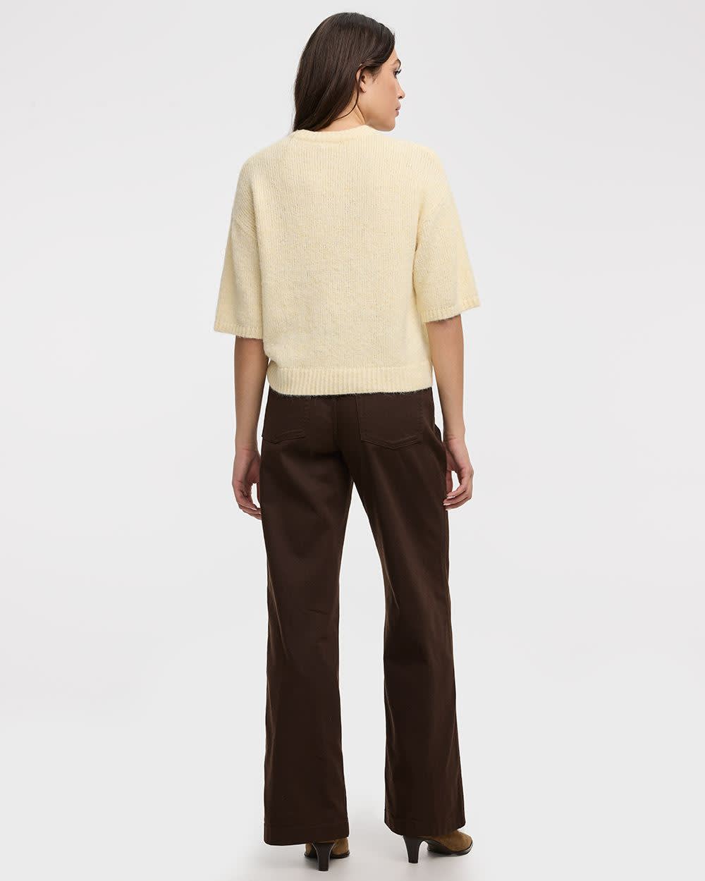 Pull ample à manches aux coudes et col rond