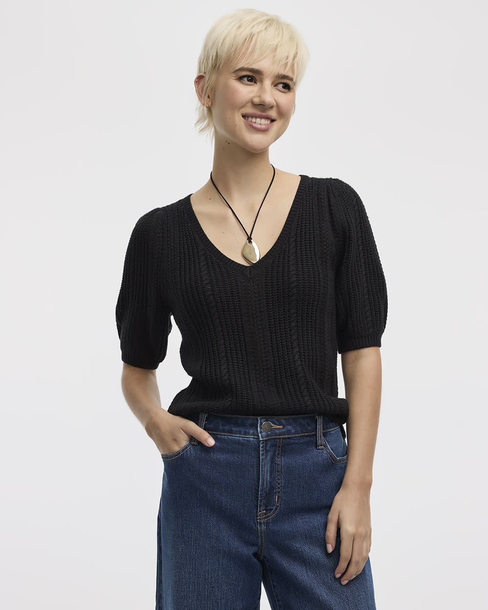 Pull à manches aux coudes bouffantes et col V