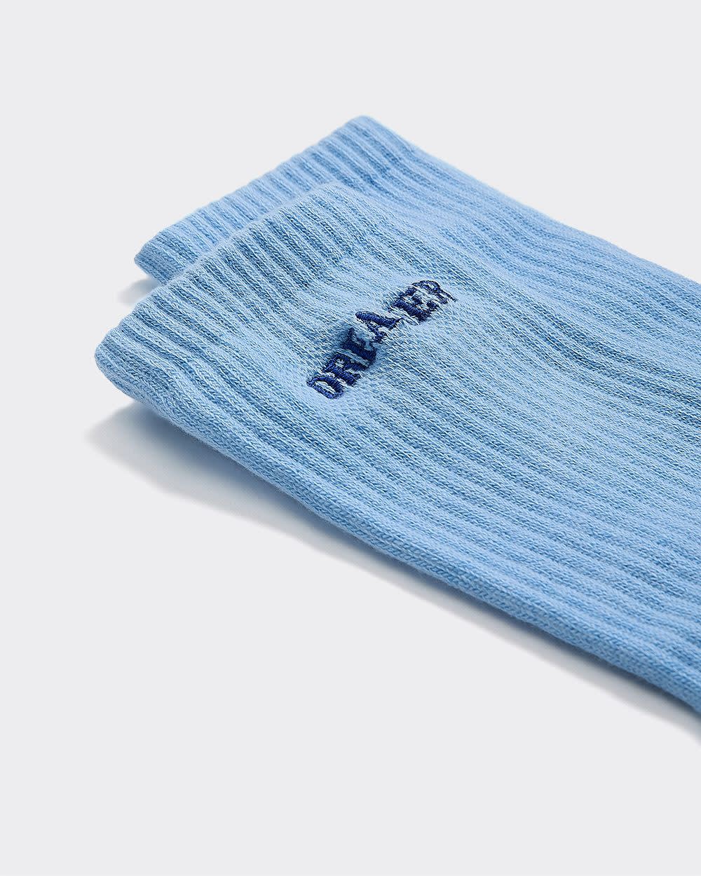 Bas côtelés avec mot à l'ourlet