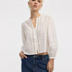 Puffy-Sleeve Split-Neck Blouse with Eyelet Trims
