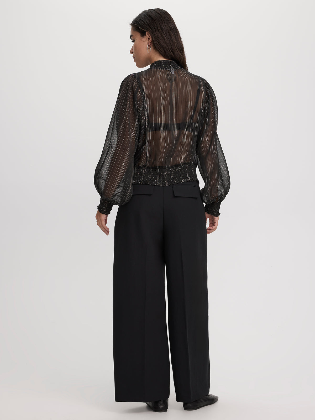 Blouse à manches longues et col montant avec fibres métalliques