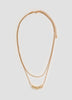 Collier court à deux chaînes avec pendentifs style galet