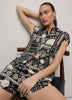 Extended-Sleeve Buttoned-Down Blouse