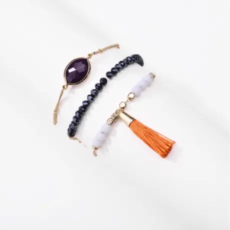 Ensemble de 3 bracelets avec cristaux violets et pompon orange- Don't AsK