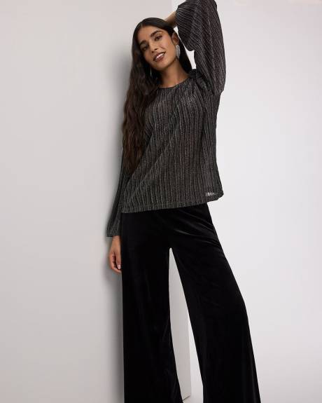 Blouse scintillante à manches longues et col rond