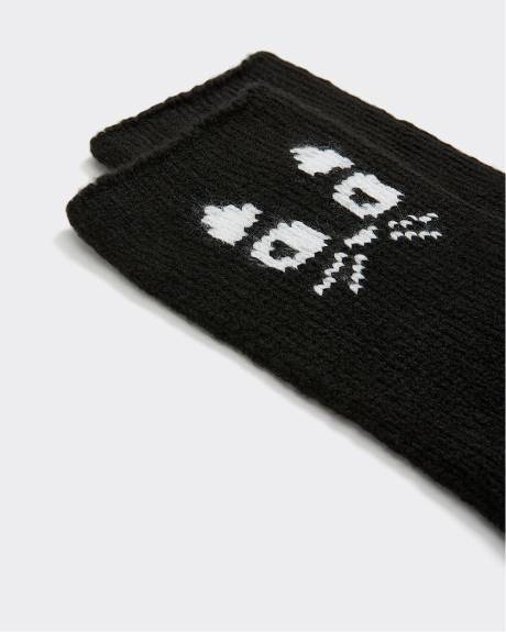 Bas d'hiver avec chat à l'ourlet