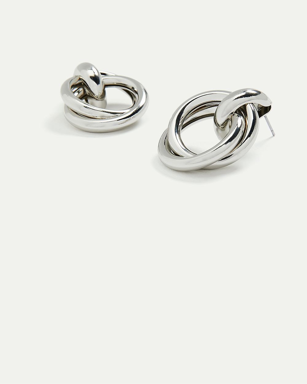 Boucles d'oreilles avec pendentifs anneaux croisés