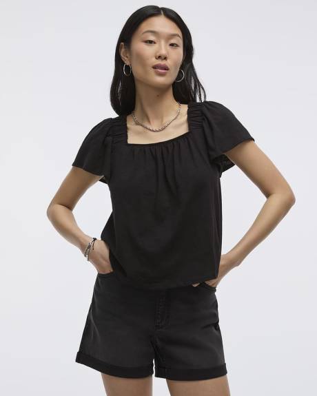 Blouse à col carré et manches courtes à volants