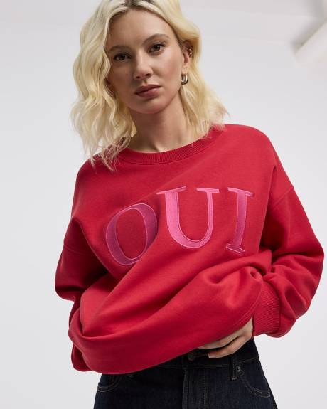 Pull en molleton à manches longues et col rond avec citations