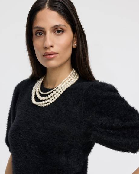 Pull pelucheux à manches courtes et col rond