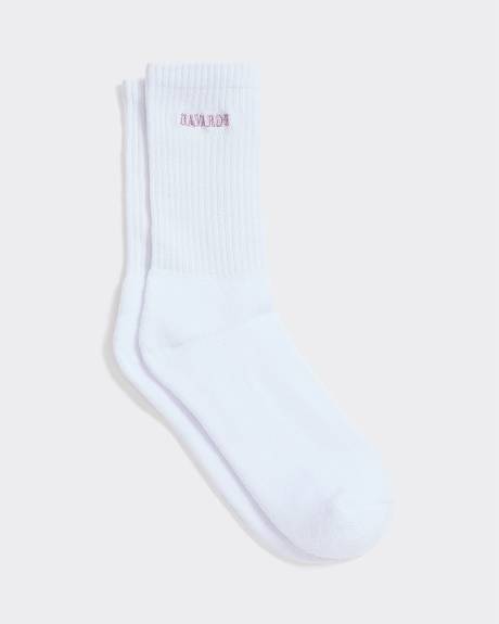 Bas côtelés avec mot à l'ourlet