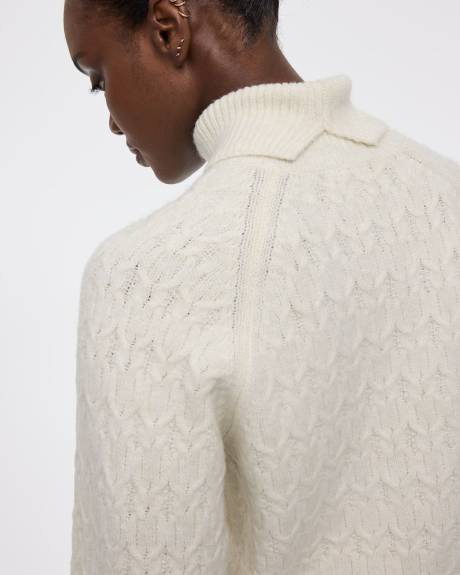 Pull &agrave; manches longues bouffantes et col montant