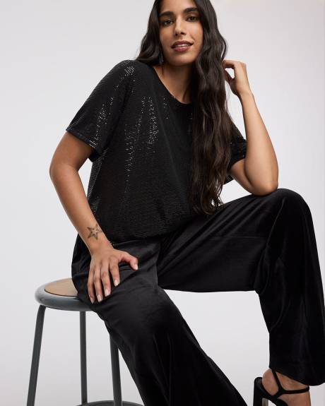 Haut à paillettes à manches courtes et col rond