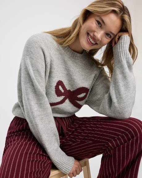 Pull à manches longues et col rond avec boucle