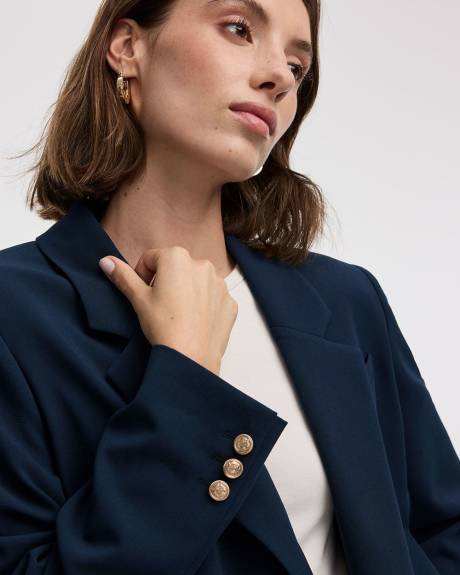 Veston à boutonnage double avec écusson