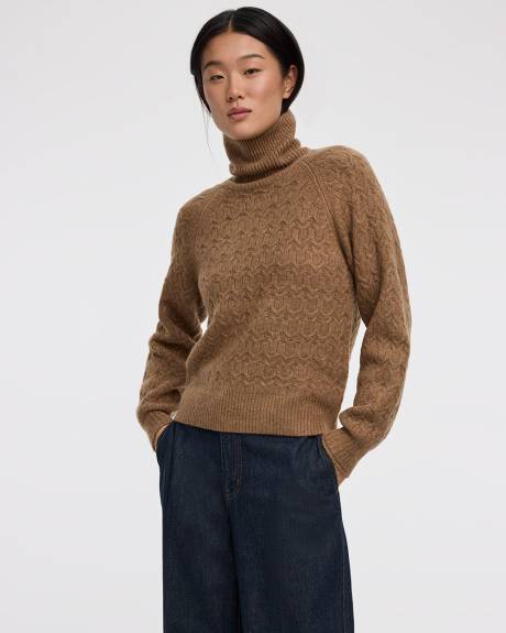 Pull à manches longues bouffantes et col montant