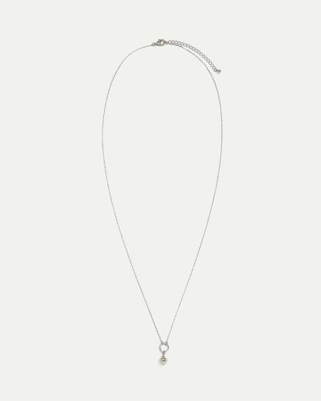 Collier long avec pendentif sphérique