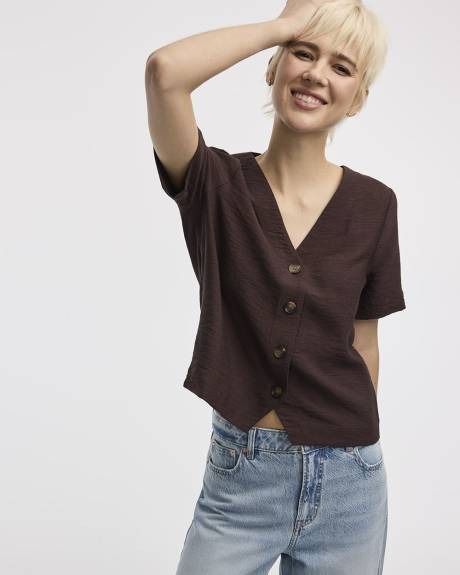 Blouse à boutonner à manches courtes bouffantes et col V