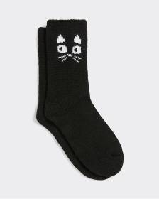 Bas d'hiver avec chat à l'ourlet