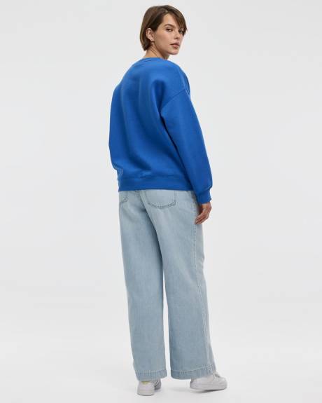 Pull en molleton à manches longues et col rond avec citations