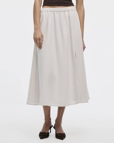 Jupe midi évasée avec fente avant