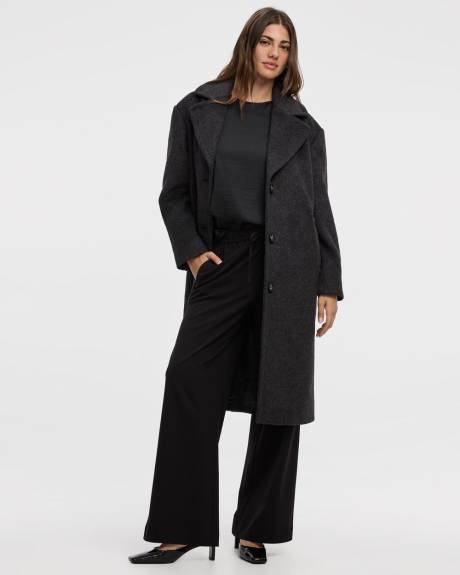 Manteau ample à boutonnage triple