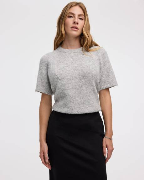 Pull ample à manches aux coudes et col rond