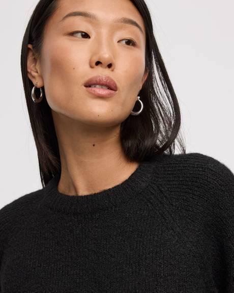 Pull ample à manches aux coudes et col rond