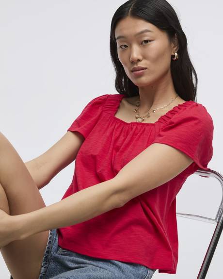 Blouse à col carré et manches courtes à volants