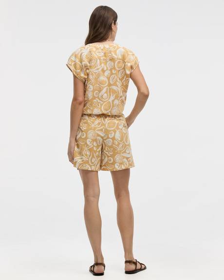 Blouse boutonnée à manches très courtes et col rond