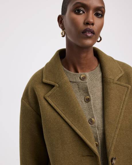 Manteau ample à boutonnage triple