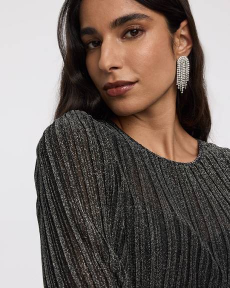 Blouse scintillante à manches longues et col rond