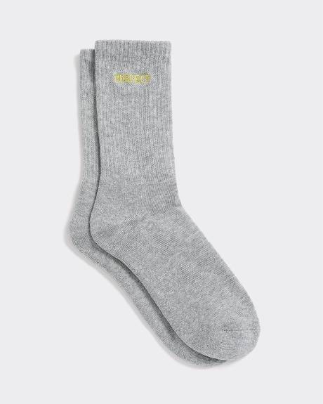 Bas côtelés avec mot à l'ourlet